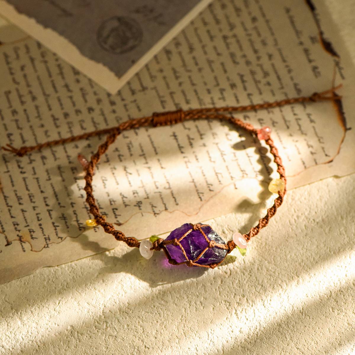 Stone of Wisdom -Amethyst Handcrafted Stone Weaving
